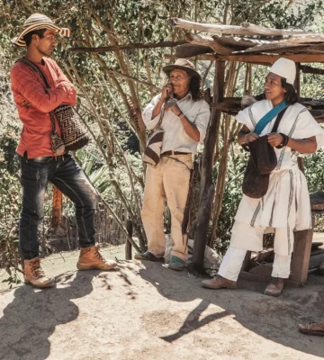a group of indigenous arhuaco men chatting relaxed 2026 01 07 00 25 34 utc e1770655435948