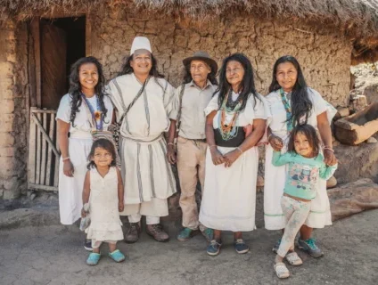 an arhuaca family poses in front of their house in 2026 01 07 06 24 55 utc 2 scaled e1770397193529